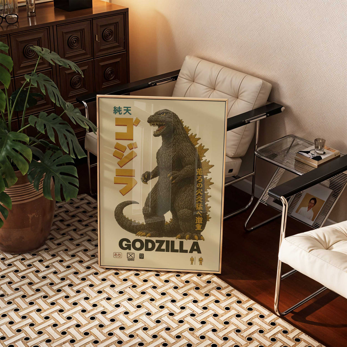 Godzilla movie poster shown framed on a wall