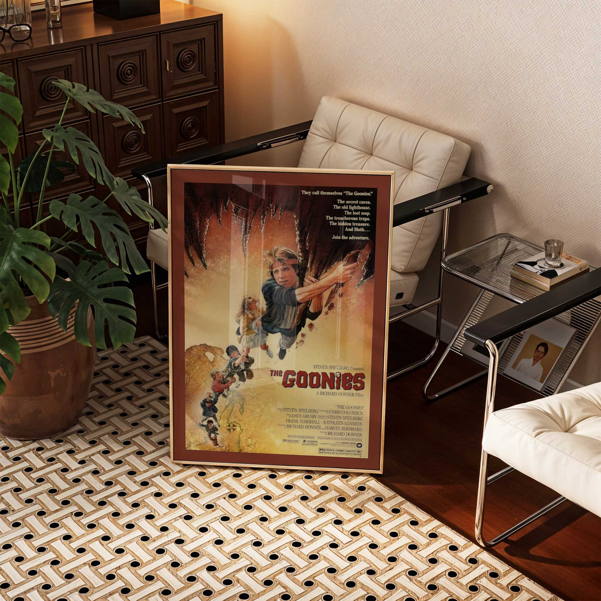 The Goonies movie poster shown framed on a wall