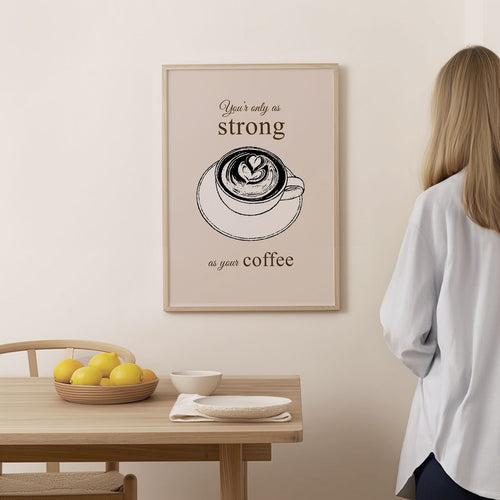 Coffee Poster – As Strong as Your Coffee – gerahmt an der Wand